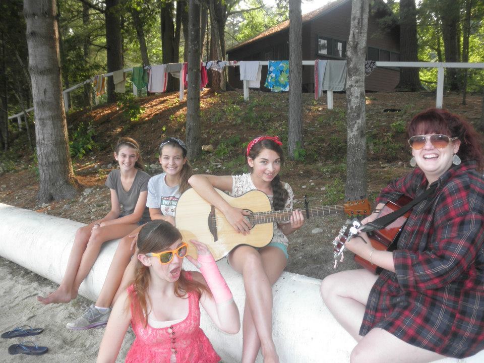 Learning to play the guitar. (Photo courtesy of Camp CenterStage)