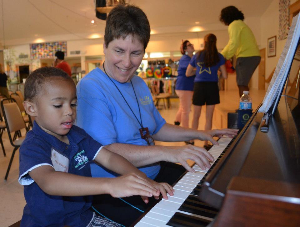 Playing with children and expanding their skills and self-confidence. (Photo courtesy of Camp CenterStage)